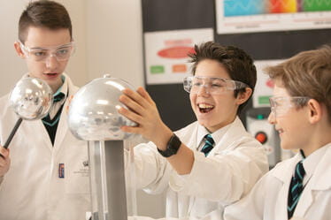 Three students in a Science lesson